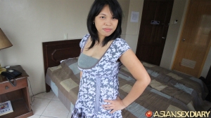 Big boobed Asian girl in pretty dress