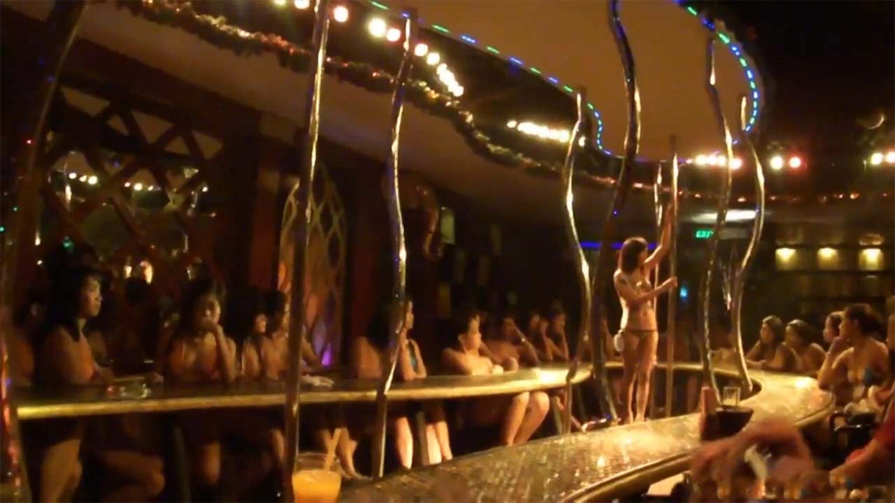 Girls show off their Body Paint Tits on stage at club