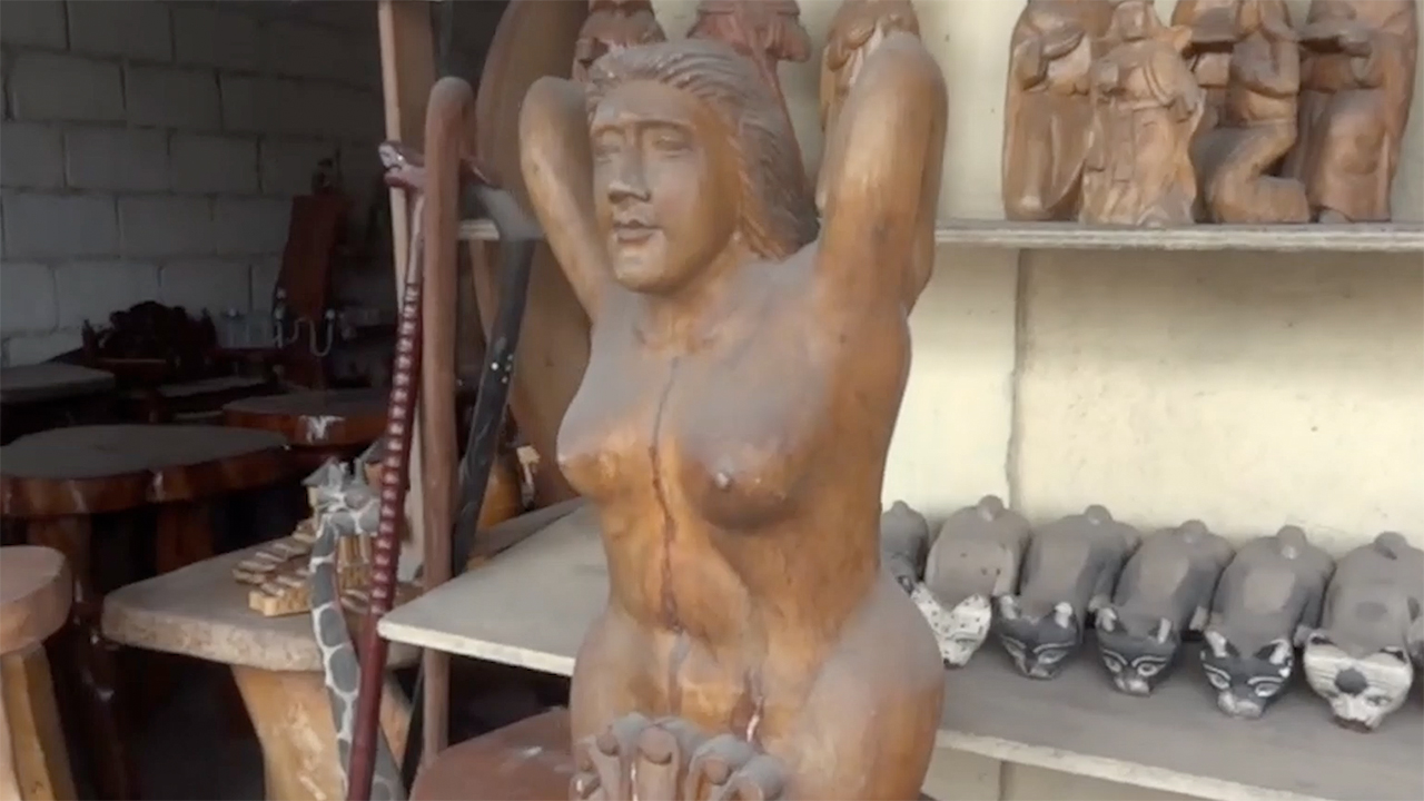 Wooden carved Nude Bust in shop