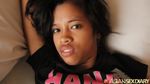 Thick lips teen stares at camera