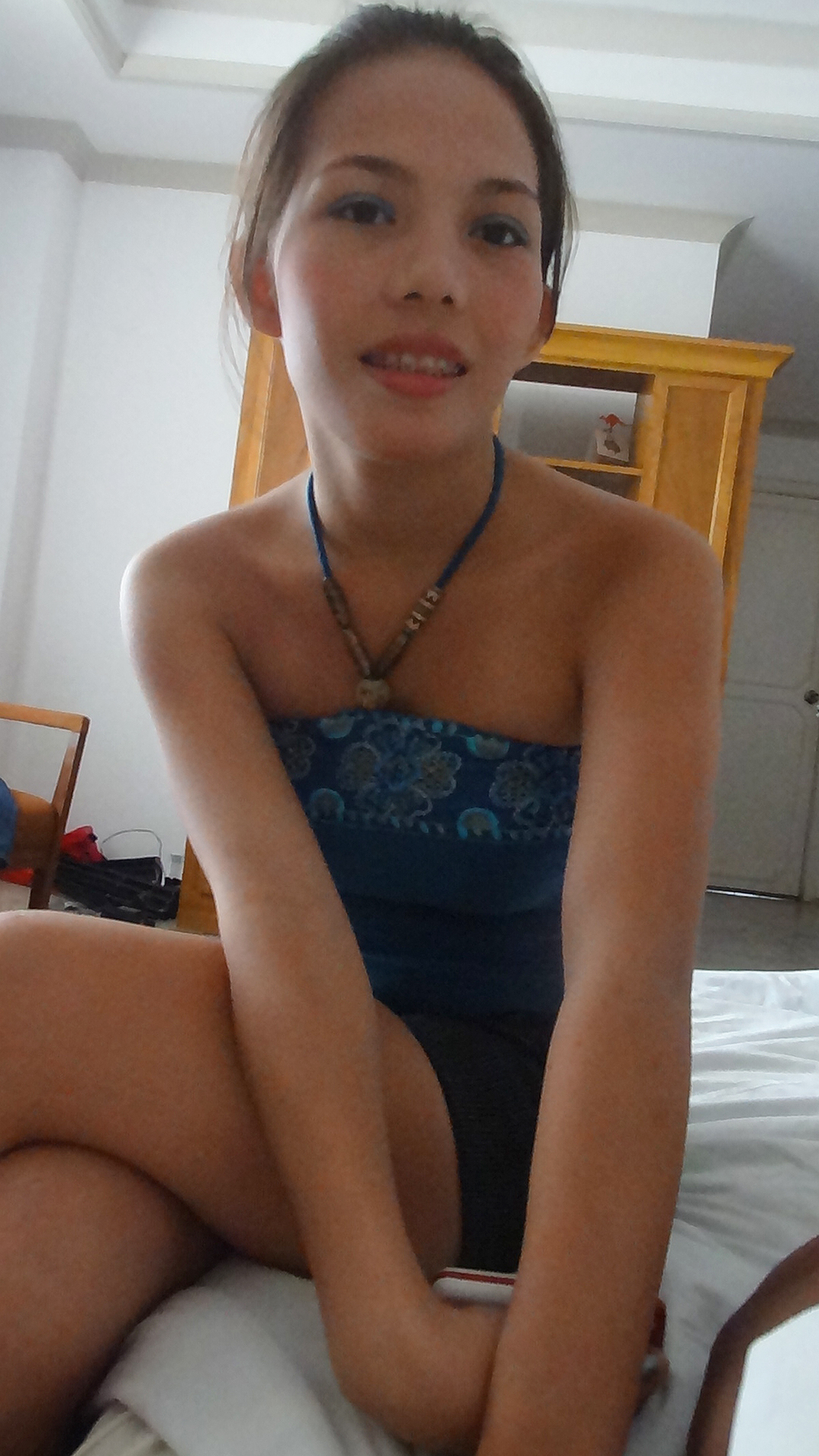 Asian Sex Diary Ann sits cutely in short dress