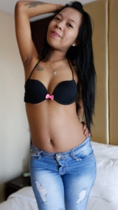 Asian Sex Diary Aprilia wearing black bra and tight skinny jeans