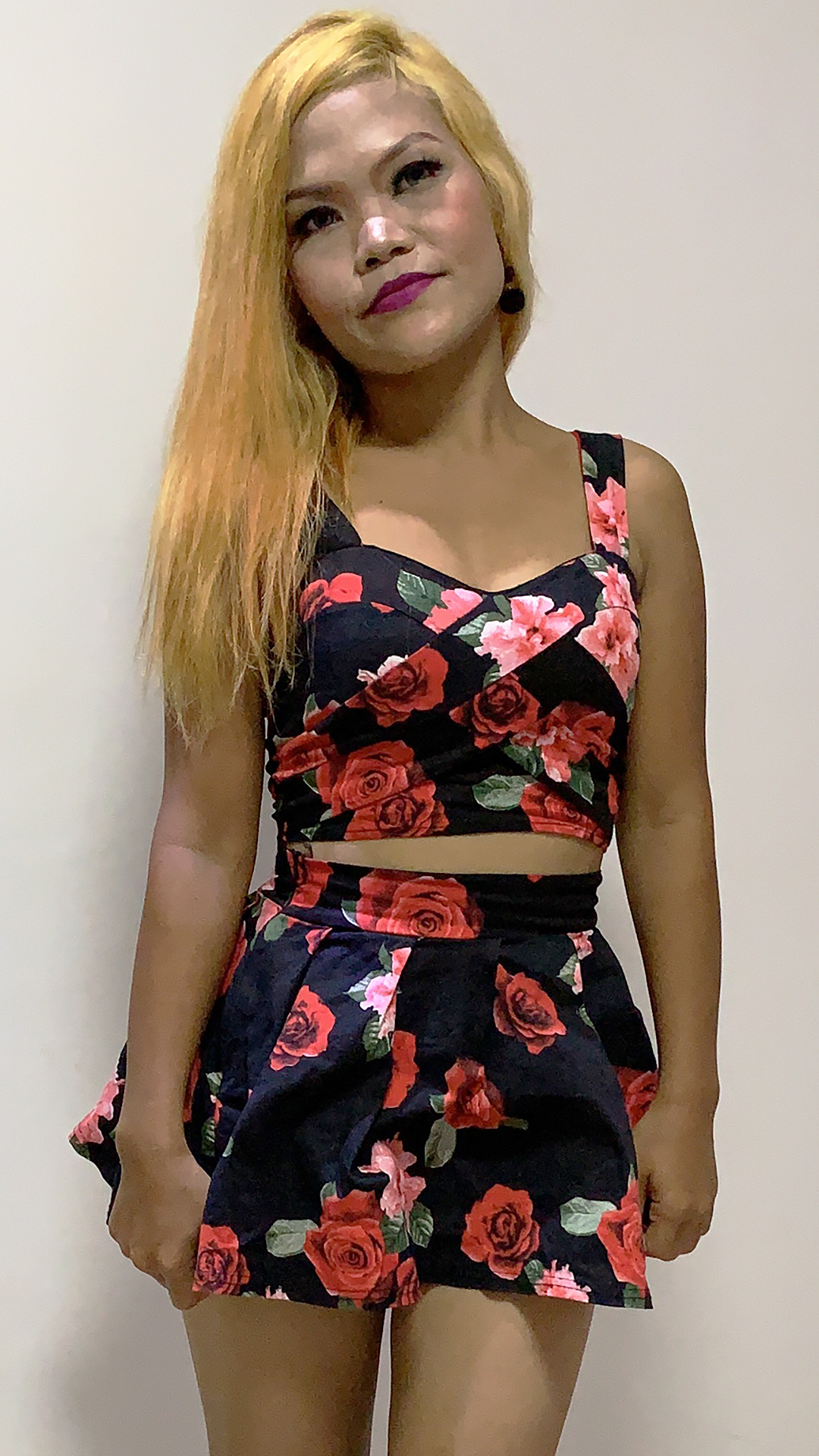 Asian Sex Diary Barbie B standing with long blonde hair and flower pattern skirt