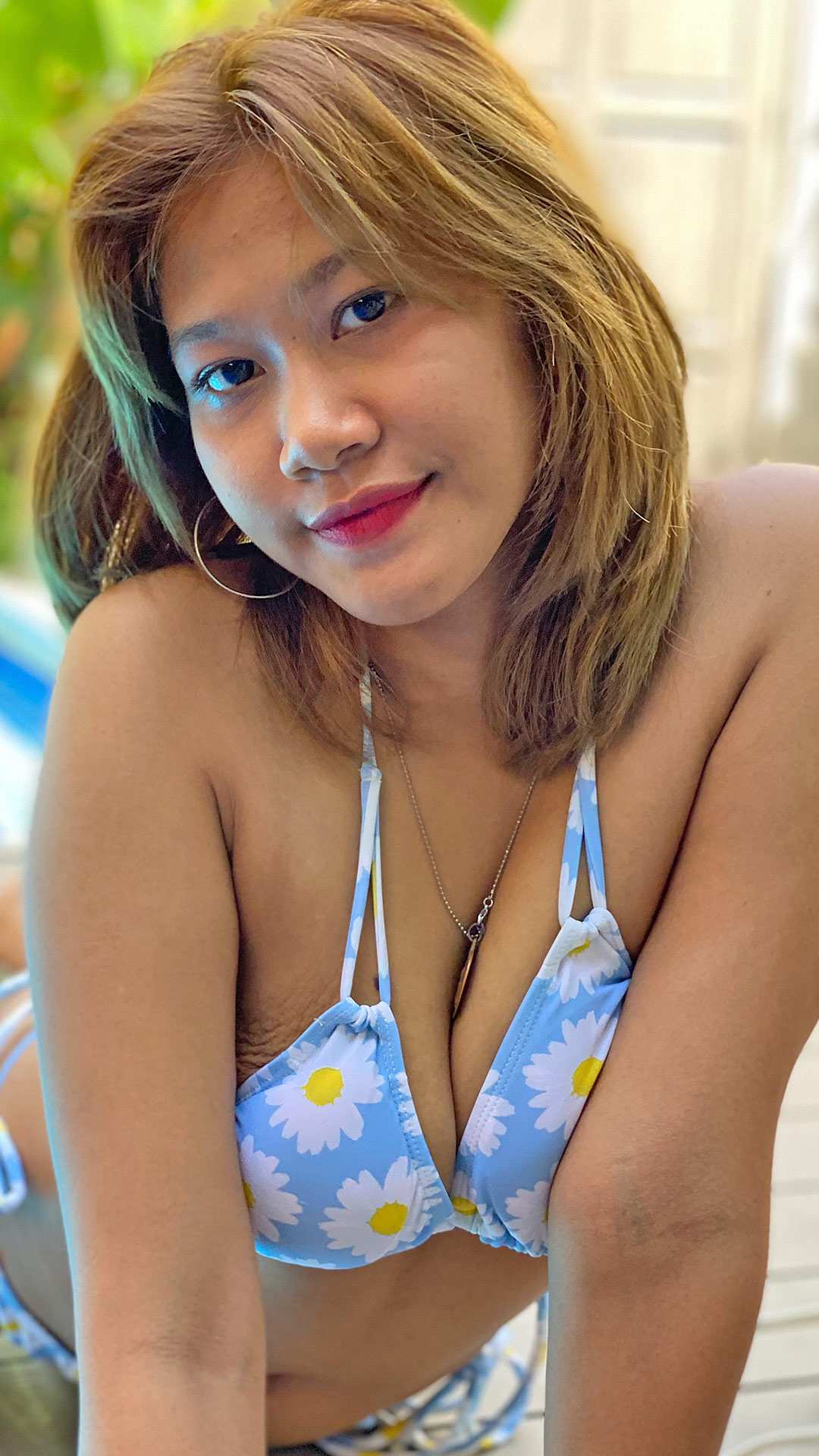 Busty Asian Sex Diary Noodee posing in her swimsuit