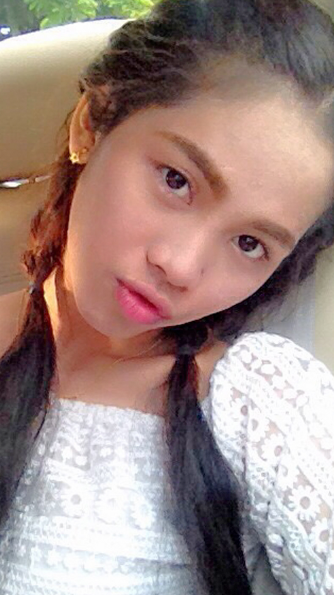 Little Asian Sex Diary Mutmee sitting in her car looking pretty