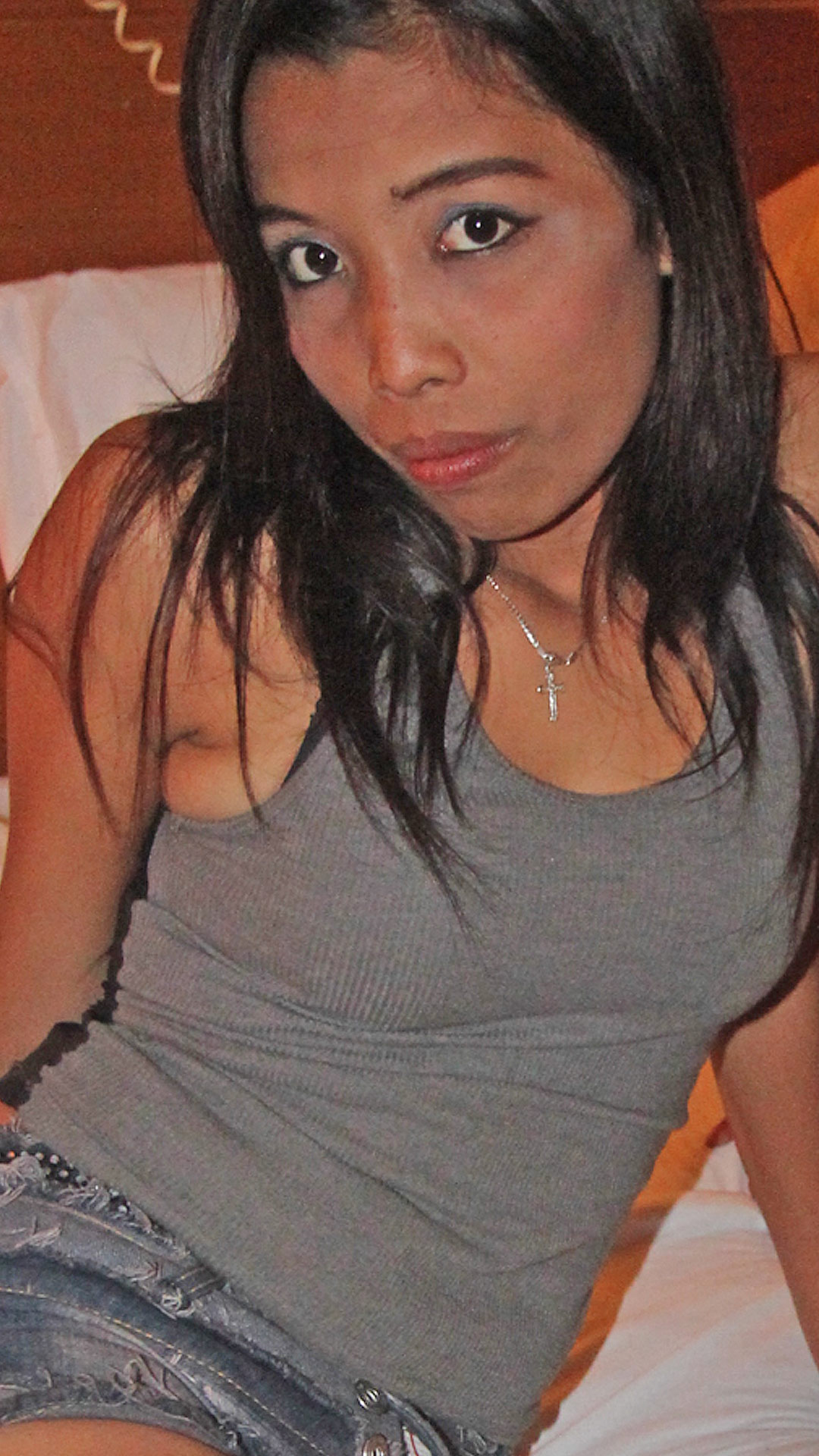 Mixed Asian Sex Diary Nicole posing on the hotel bed