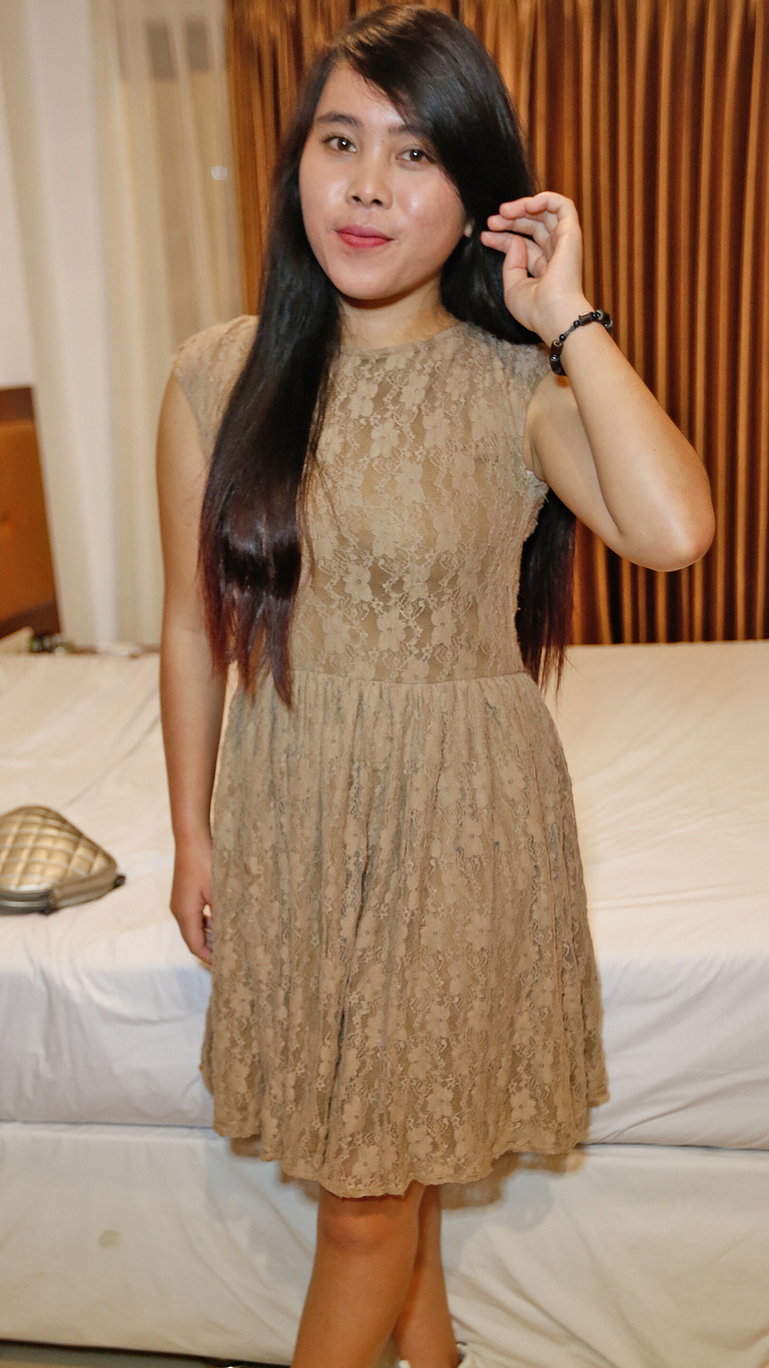 Shy Asian Sex Diary Mya standing sexy in her outfit