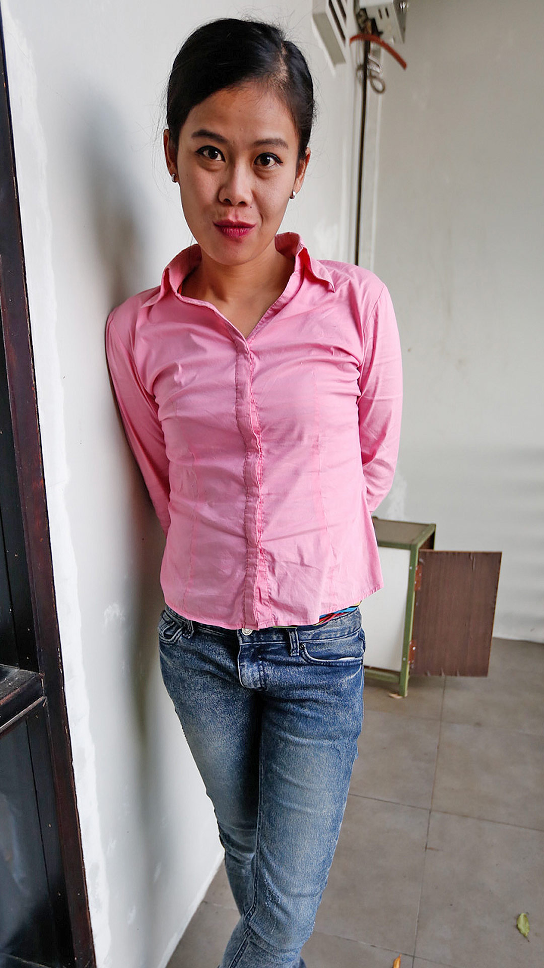 Skinny Asian Sex Diary Noni posing in her shirt and jeans