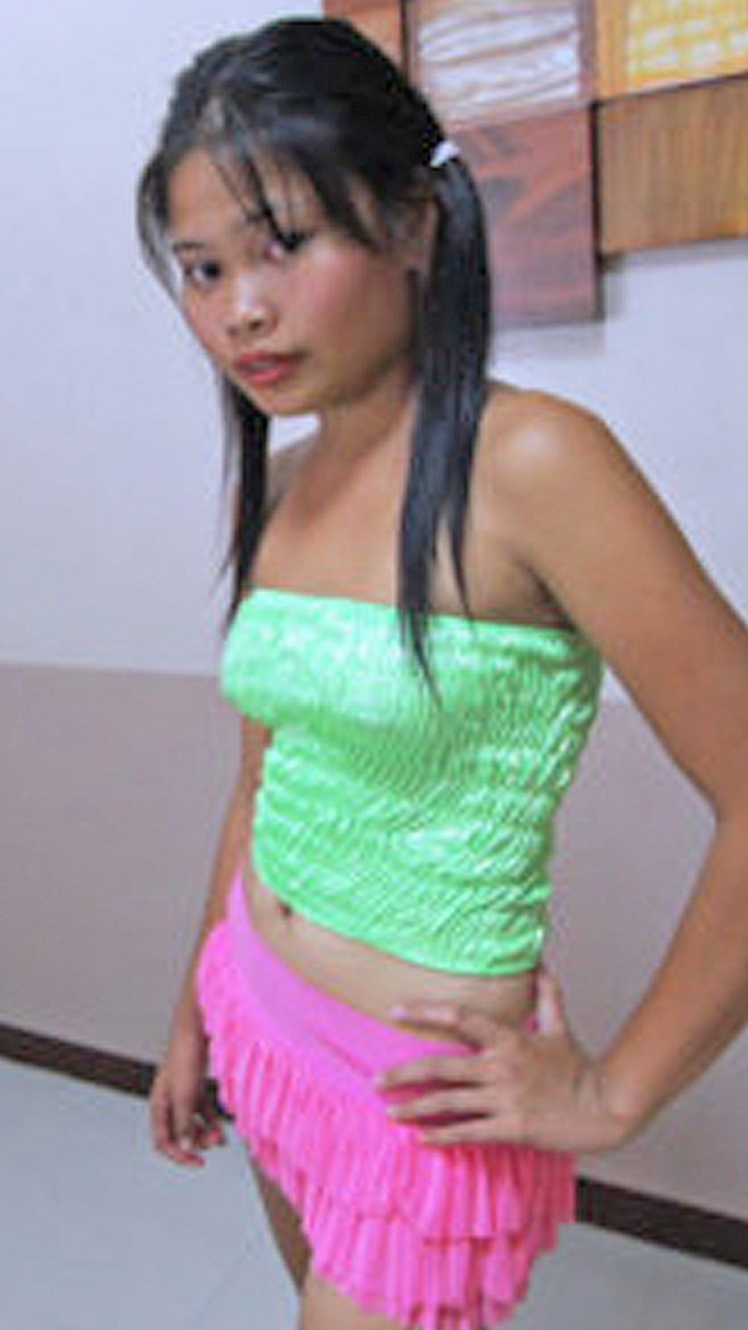 Teen Asian Sex Diary Nhei standing in her outfit