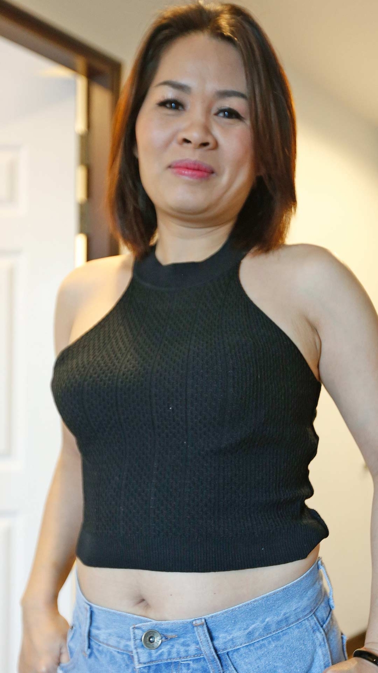 Milf Asian Sex Diary Monica standing in her sexy top