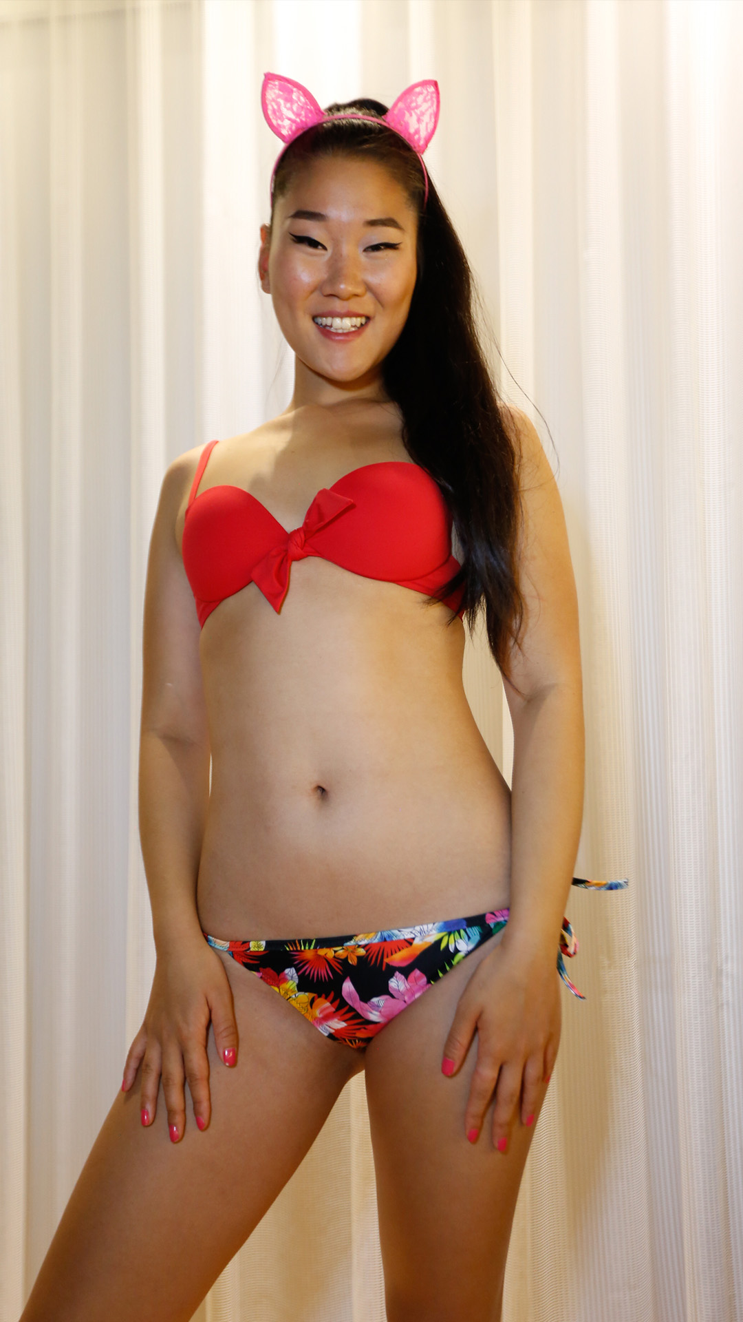 Asian Sex Diary Katana joyfully poses in swimwear
