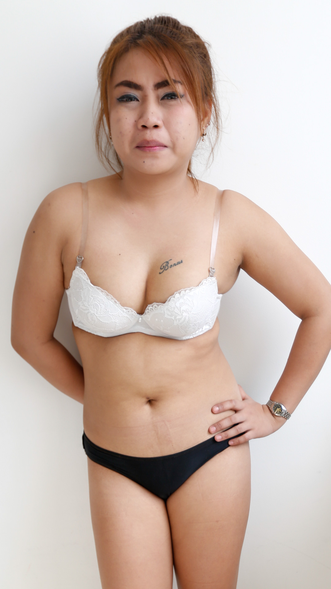 Petite Asian Sex Diary Pow has her plump titties wrapped up in white bra