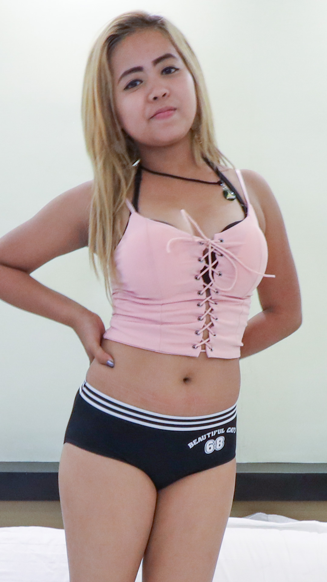 Thick body hotty Asian Sex Diary Thom poses in tank top and panties