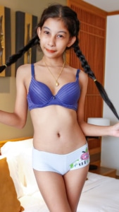 Playful and seductive Asian Sex Diary Soe pulls her pigtails while in bra and panties