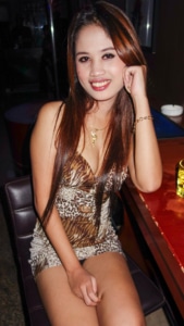 Slender sexy Asian Sex Diary Rosa wears her leopard skin dress