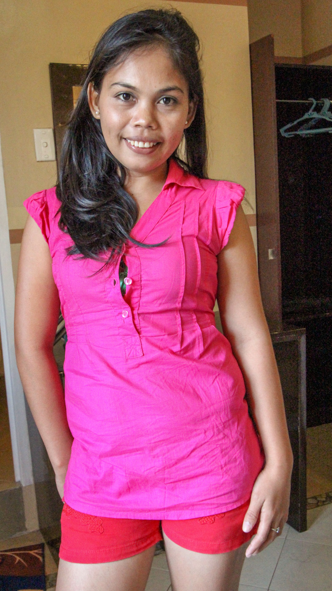 Asian Sex Diary Veronica smiles broadly while posing for the camera