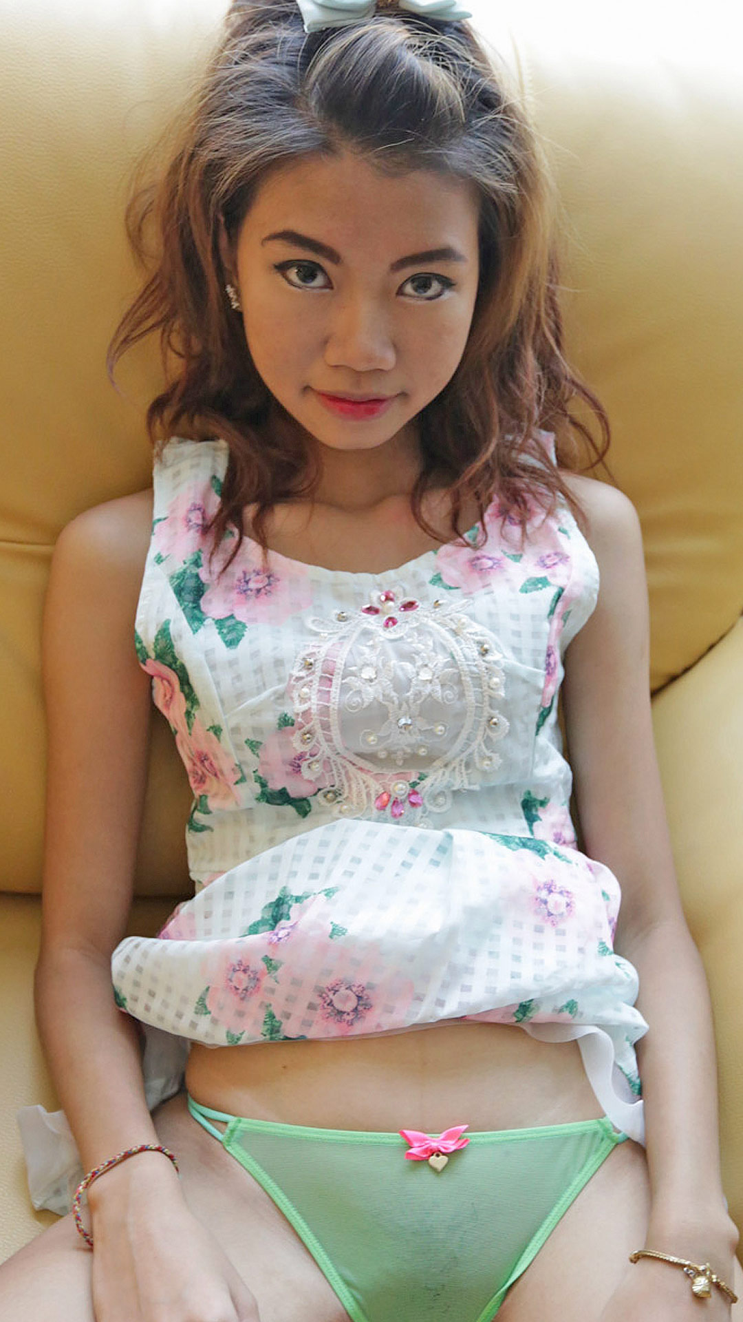 Tiny Asian Sex Diary Oay sits in her sexy green panties