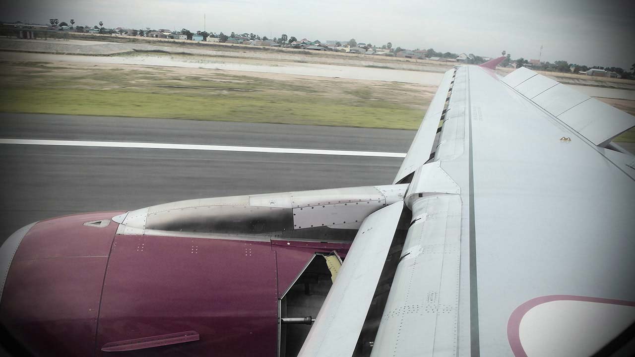 Articistc View Out Plane Window when Landing in Phnom Pehn