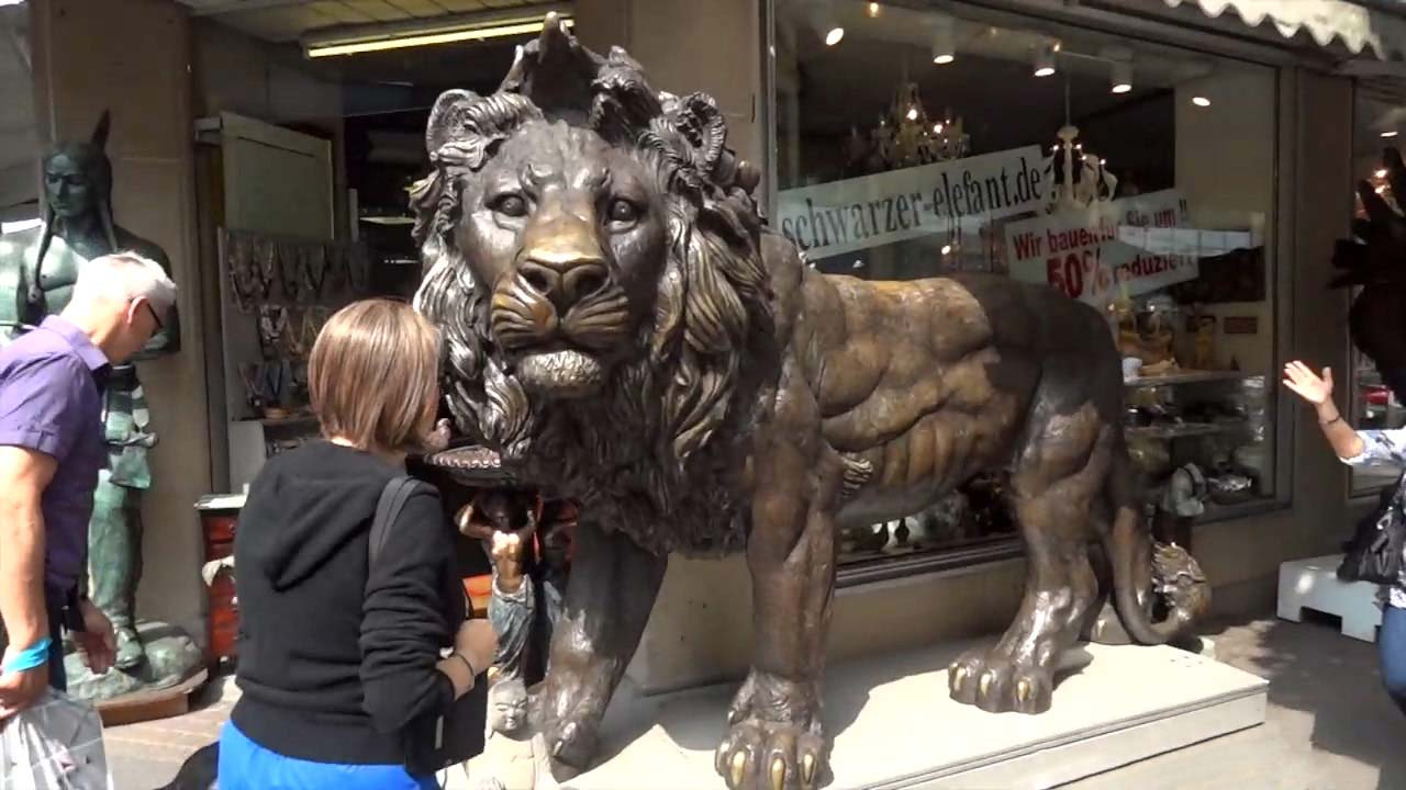Bronze Lion Statue outside of a Koln shop