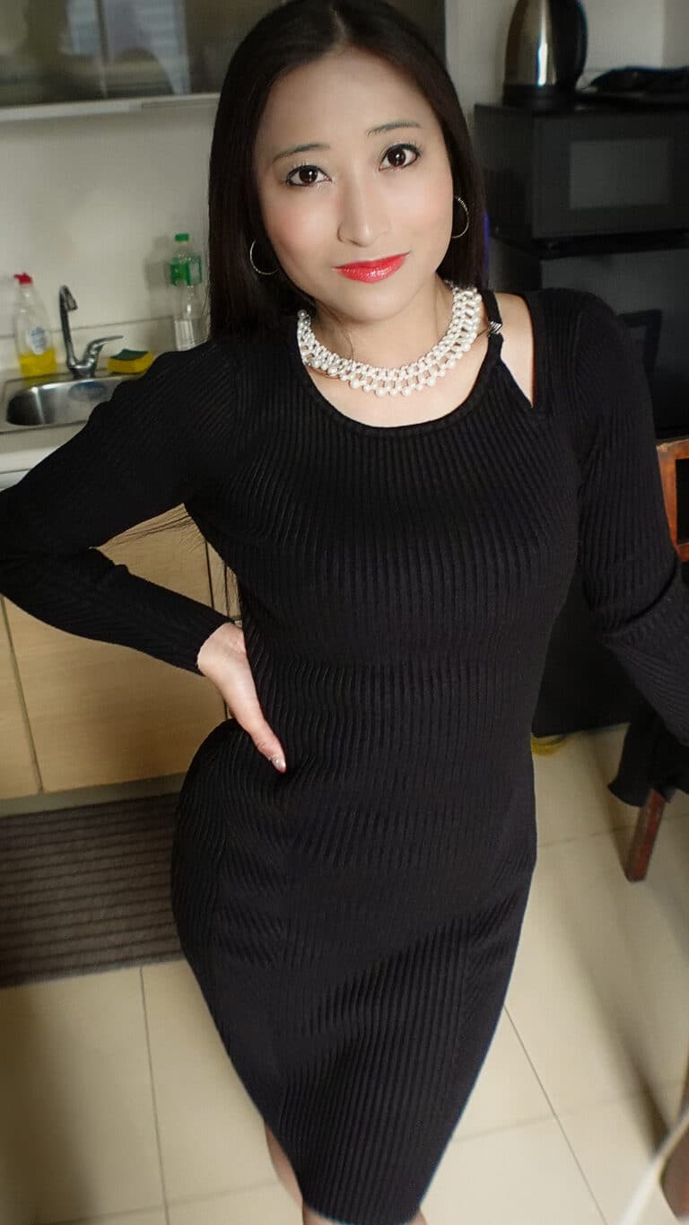 Japanese star Asian Sex Diary Ayumy standing in black dress